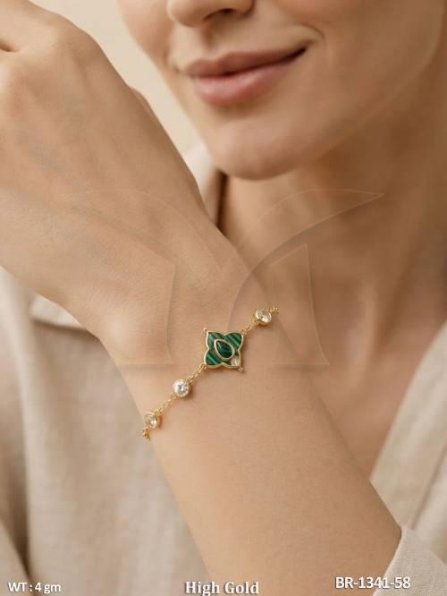 elegant-high-gold-green-charm-bracelet-for-women