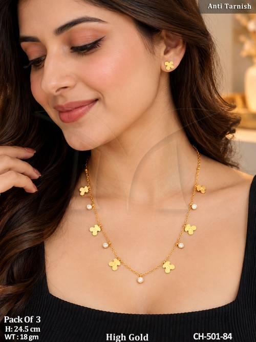 fancy-gold-charm-chain-with-matching-stud-earrings