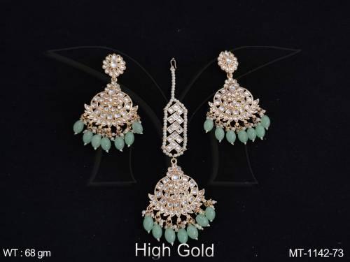 antique-stones-clustered-pearl-high-gold-polish-designer-maang-tikka-with-earring