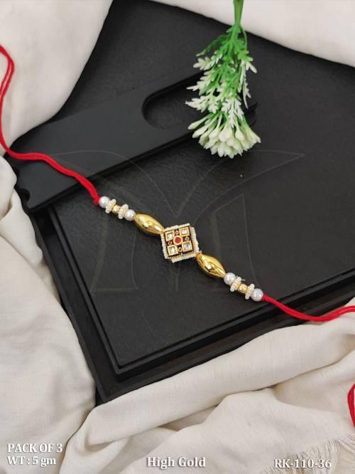 antique-designer-pearl-rakhi-high-gold-pack-of-3