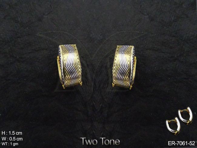 broad lined broad delicate earrings detail