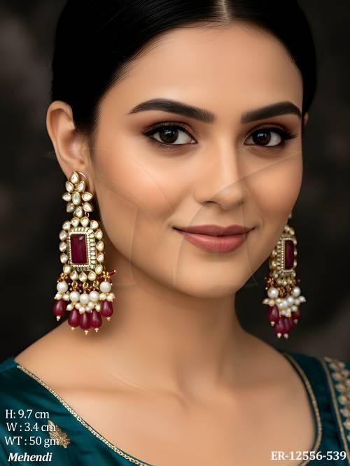 high-gold-polish-fancy-desing-clustered-pearl-pary-wear-long-kundan-earring