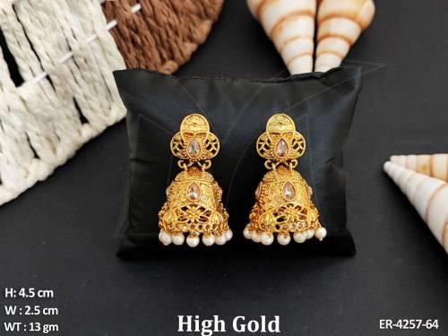 hold triangular jhumki earrings detail