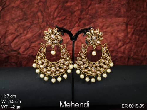 paan engraved curved antique earrings.