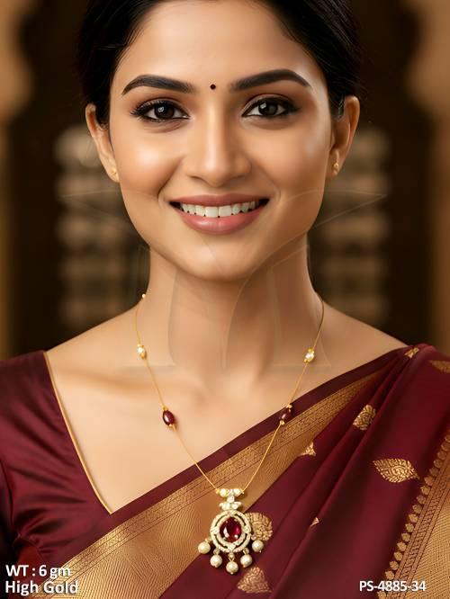 high-gold-finish-oval-center-pendant-set-with-pearl-drops