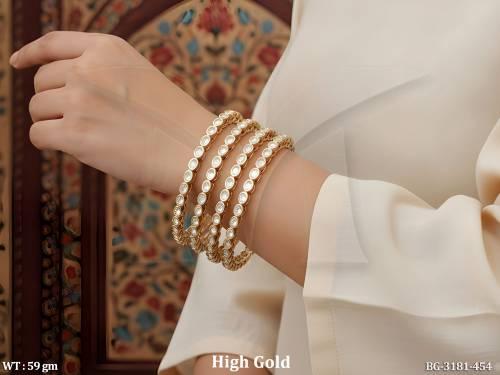 High Gold Kundan Bangles Set With Oval Stone Design