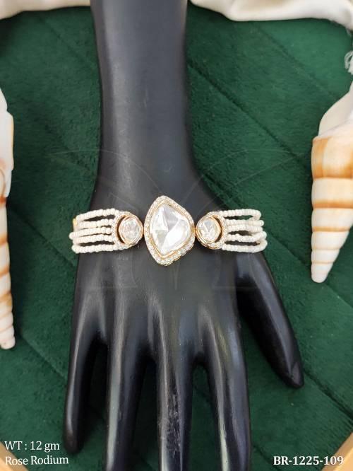 kundan-pearl-bracelet-with-pear-cut-center-stone