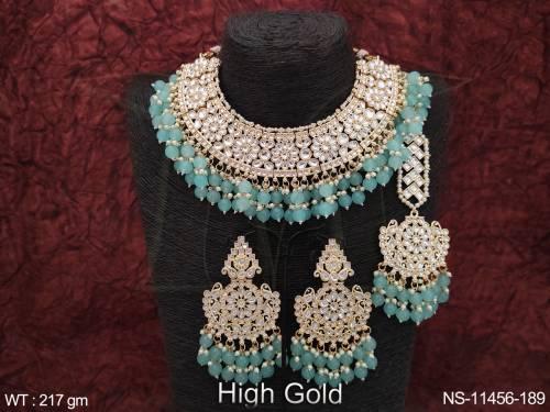 high-gold-polish-fancy-design-clustered-pearl-kundan-stones-party-wear-kundan-jewellery-choker-necklace-set