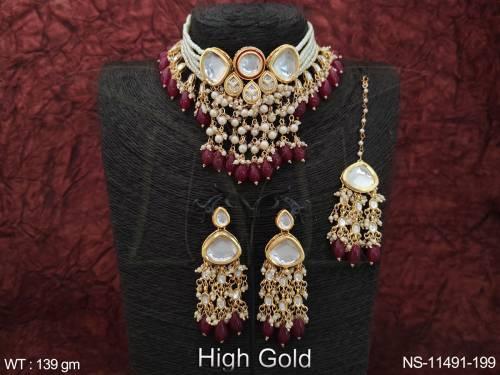 high-gold-polish-fancy-design-kundan-stones-party-wear-kundan-jewellery-choker-necklace-set-with-maang-tikka-