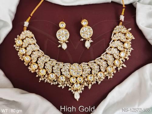 fancy-design-high-gold-polish-clustered-pearl-desinger-party-wear-kundan-stones-kundan-jewellery-kundan-short-necklace-set
