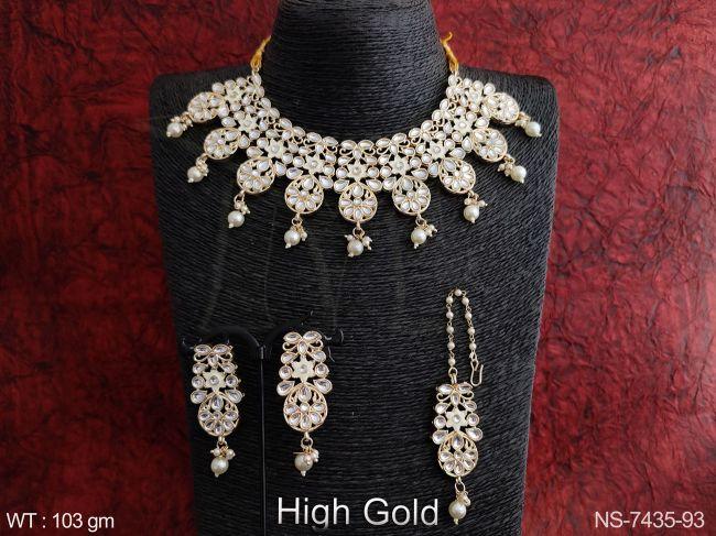 designer kundan jewelry fancy stylish high gold polish clustered pearl party wear necklace set with maang tikka