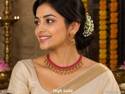 high-gold-fancy-ruby-tushi-necklace-with-earrings