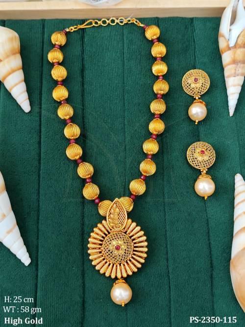 Golden beaded ruby green antique pendant set