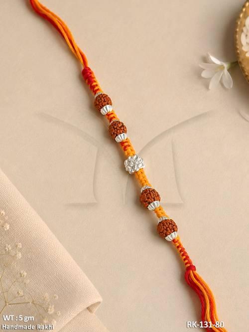 Sacred Rudraksha Temple Rakhi with Ganesh Charm