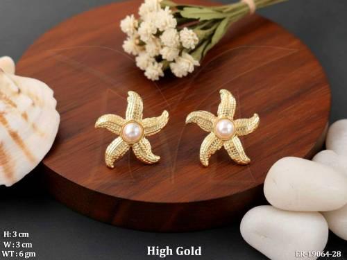 elegant-star-motif-stud-earrings-with-pearl-center-